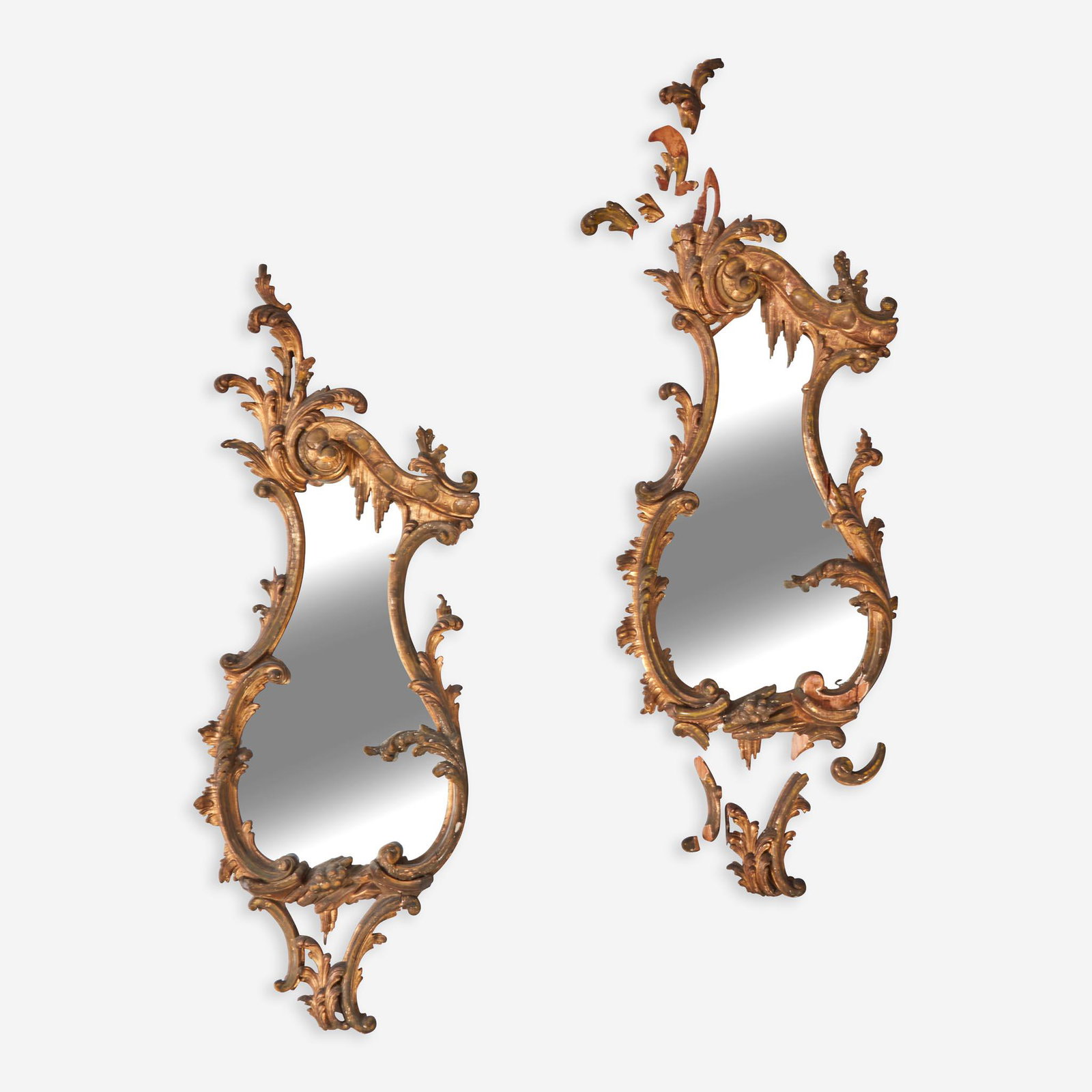 A Pair of George III Carved Giltwood Cartouche Mirrors: A Pair of George III Carved Giltwood Cartouche Mirrors circa 1755-65 (H: 38 1/2, W: 14, D: 3 1/2 in.) Provenance Purchased by the Philadelphia Museum of Art with the Germantown Tribute Fund, 1929