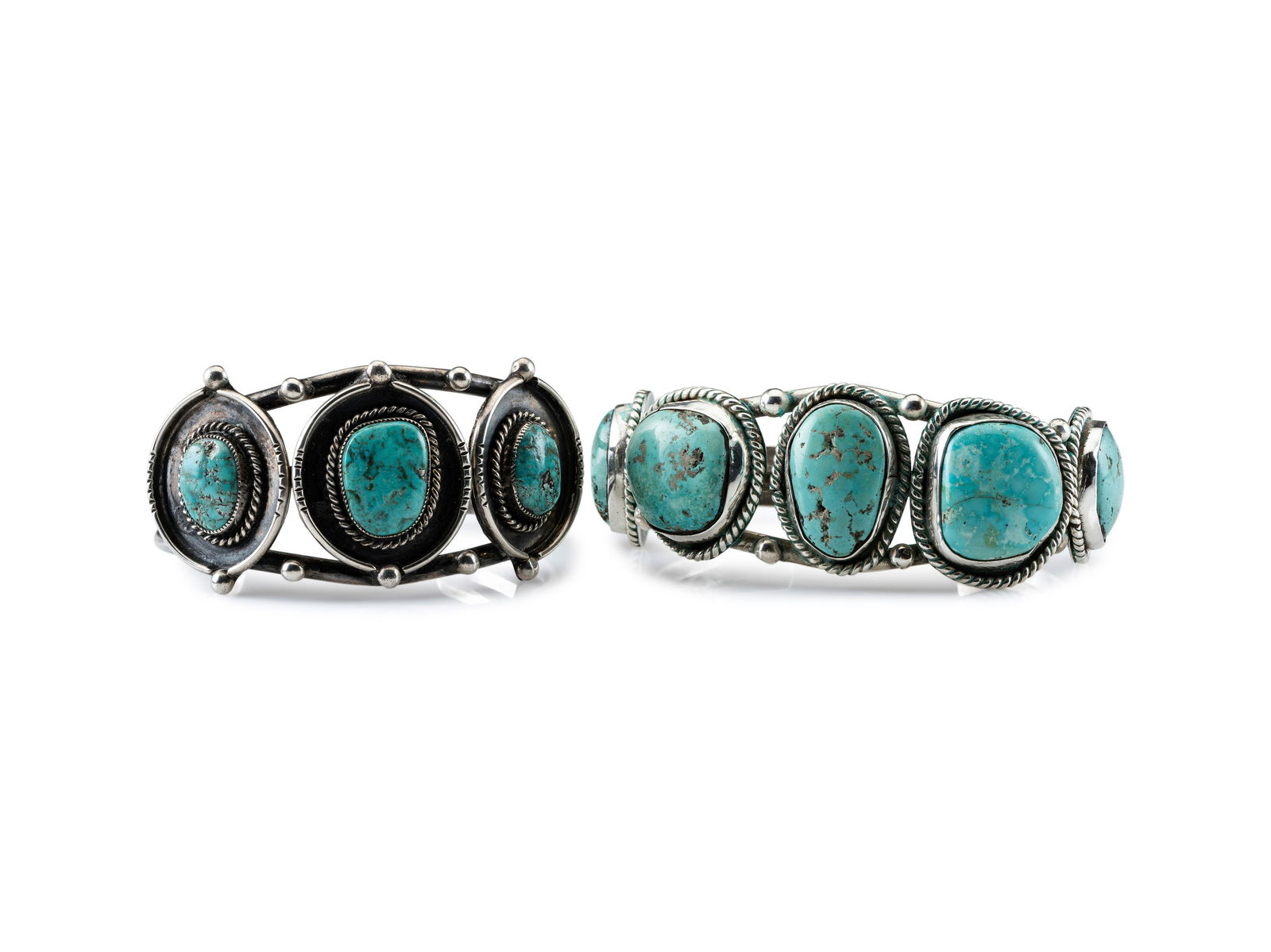 Navajo Silver Wire Cuff Bracelets, with a Row of Turquoise third quarter 20th century lot: Navajo Silver Wire Cuff Bracelets, with a Row of Turquoise third quarter 20th century lot of 2, both are not marked, sizes include: cuff width 1-1/4 inches, interior circumference 5-1/2 inches