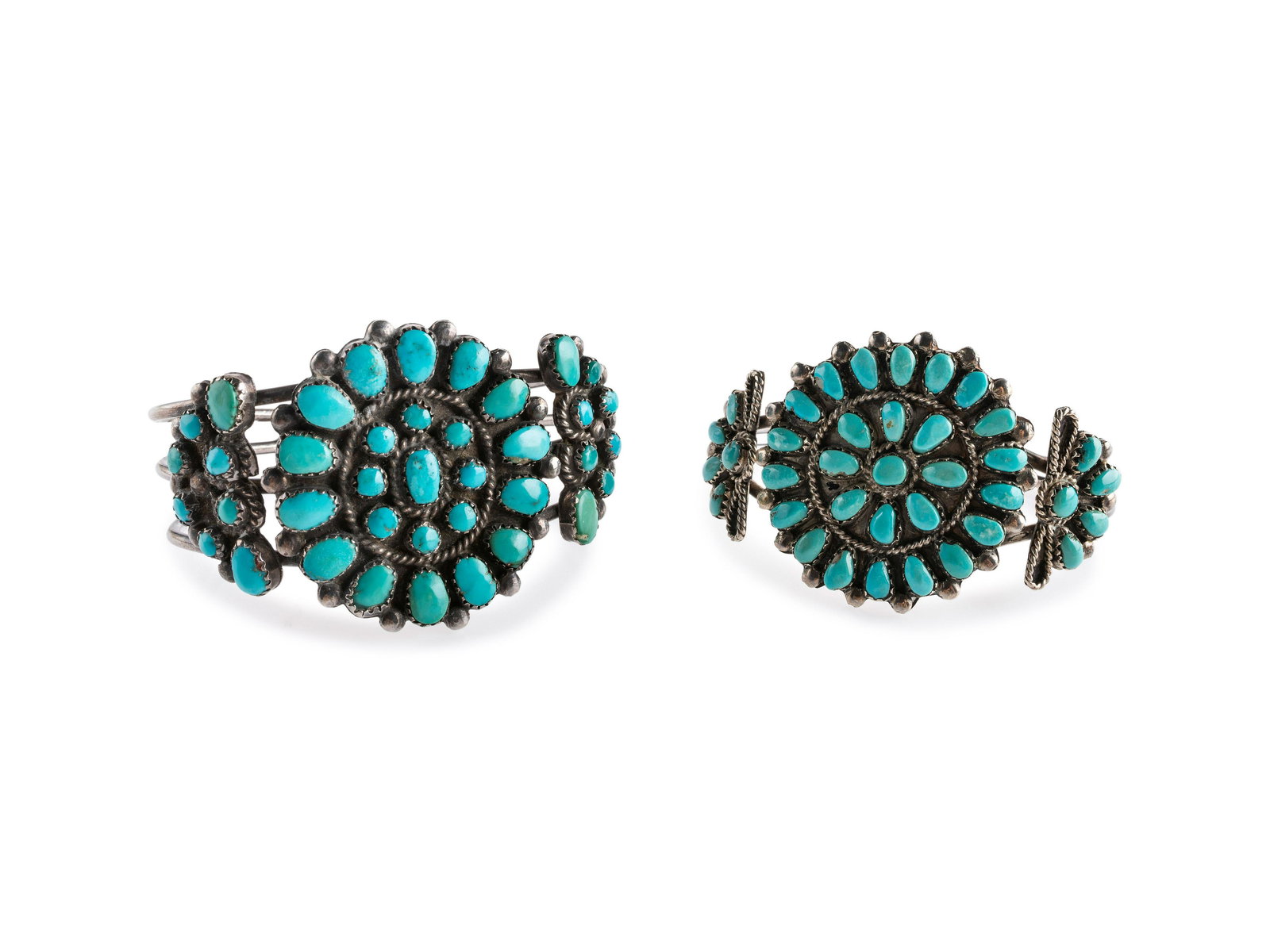 Navajo or Zui Silver Wire Cuff Bracelets, with Tuquoise Clusters third quarter 20th century lot of: Navajo or Zui Silver Wire Cuff Bracelets, with Tuquoise Clusters third quarter 20th century lot of 2, neither are marked, sizes include; cuff width 1-1/2 inches, interior circumference 5-1/2 inches x