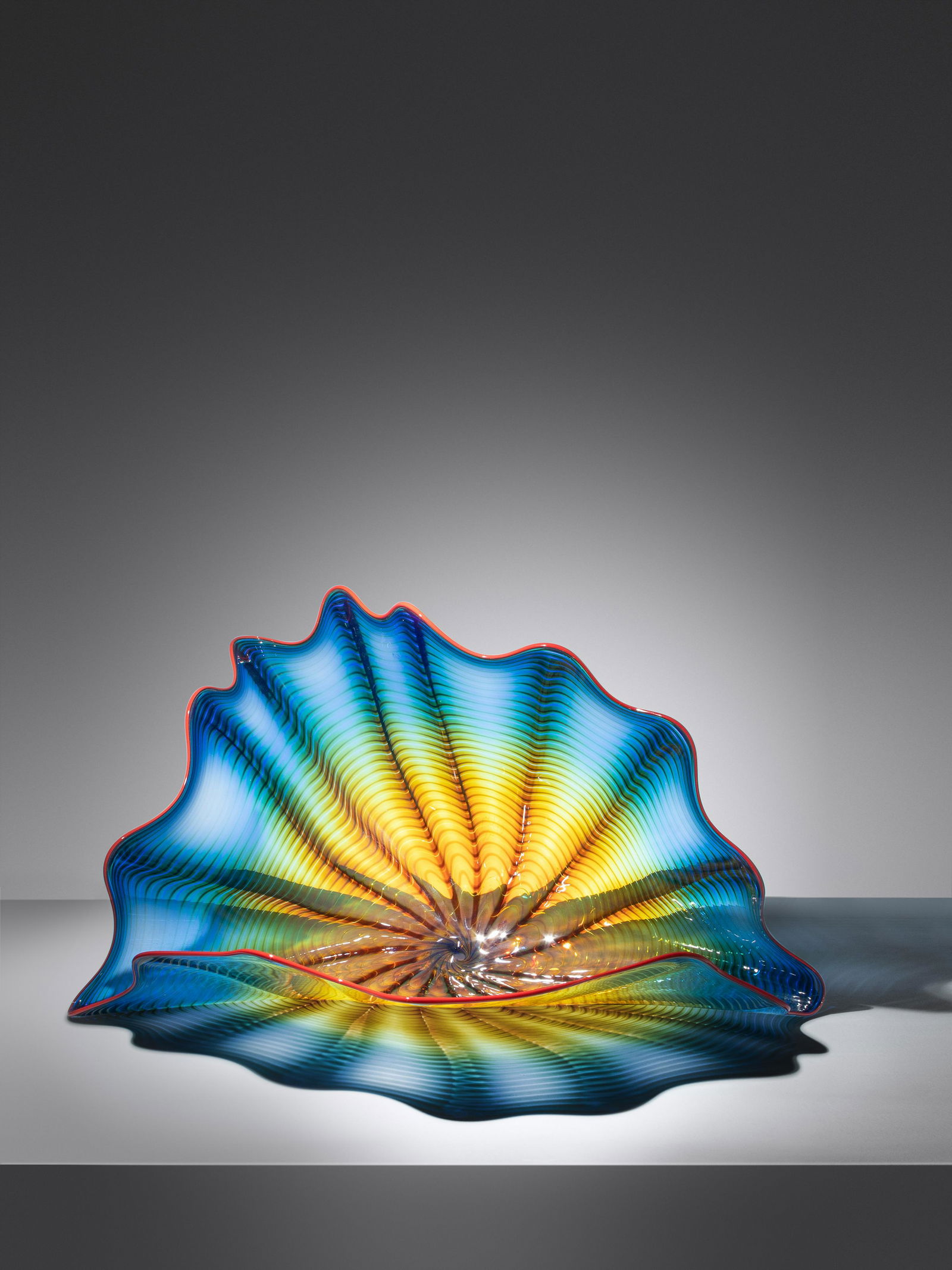 Dale Chihuly (American, b. 1941) Indigo Blue Persian with Red Lip Wrap, 1997 (1 of 3)