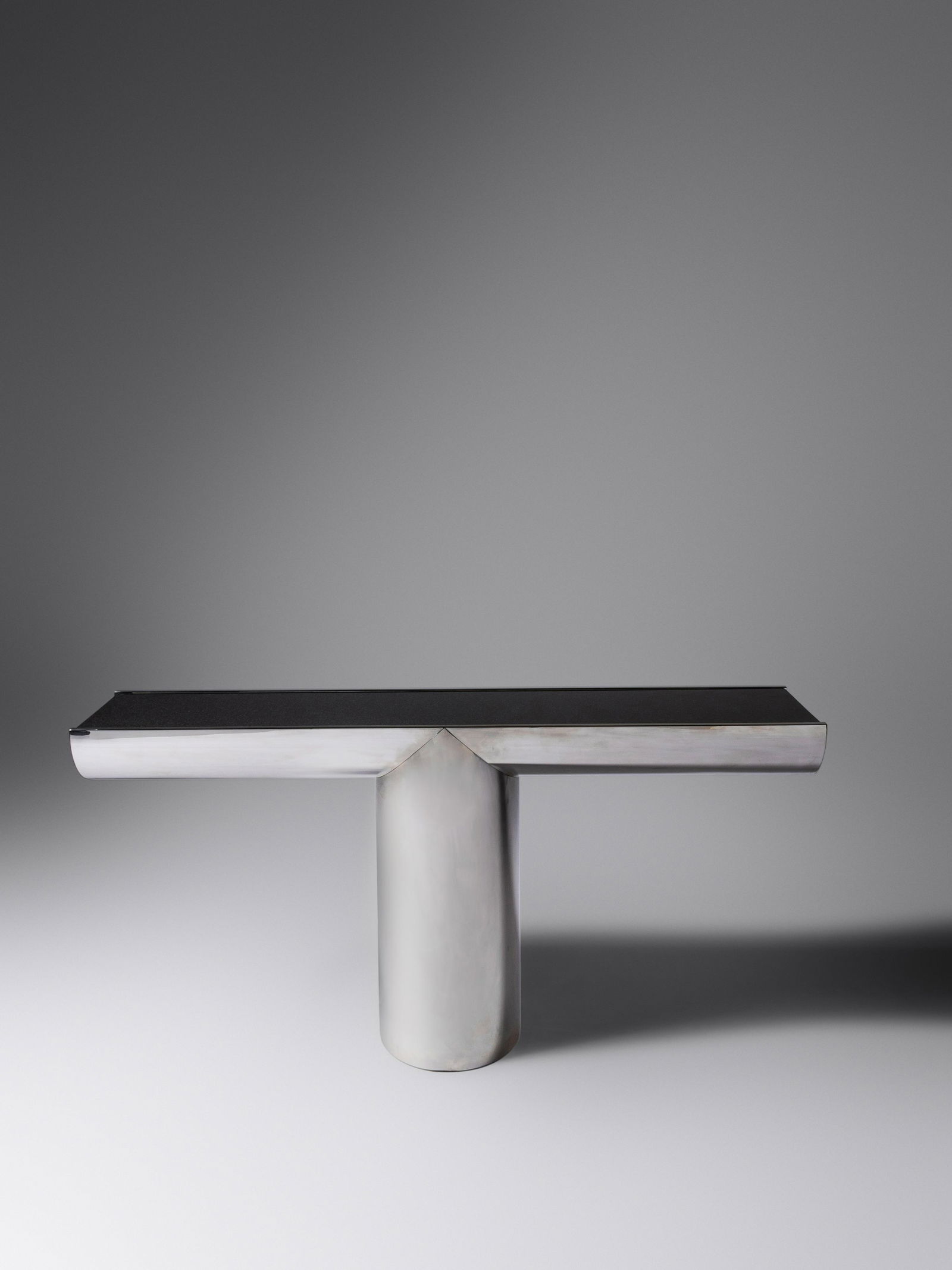 J. Wade Beam (American, 20th Century) Tee Console Table, 1970 Brueton, USA: J. Wade Beam (American, 20th Century) Tee Console Table, 1970 Brueton, USA chrome-plated steel, stone H 29 x W 61 x D 11 inches.