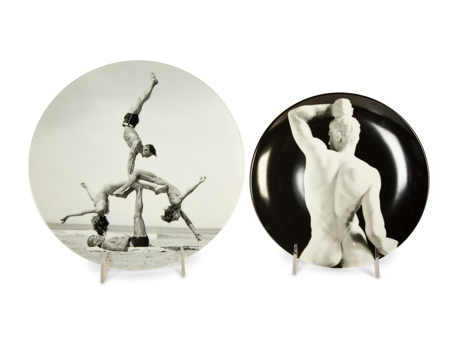 Two Porcelain Art Plates - Robert Mapplethorpe Wrestler, and Jeff Koons George Caddy Photo of: Two Porcelain Art Plates - Robert Mapplethorpe Wrestler, and Jeff Koons George Caddy Photo of Beachobatics 20th Century the Mapplethorpre by Ligne Blanche, Paris; the Koons by Bernardaud. Mapplethorpe