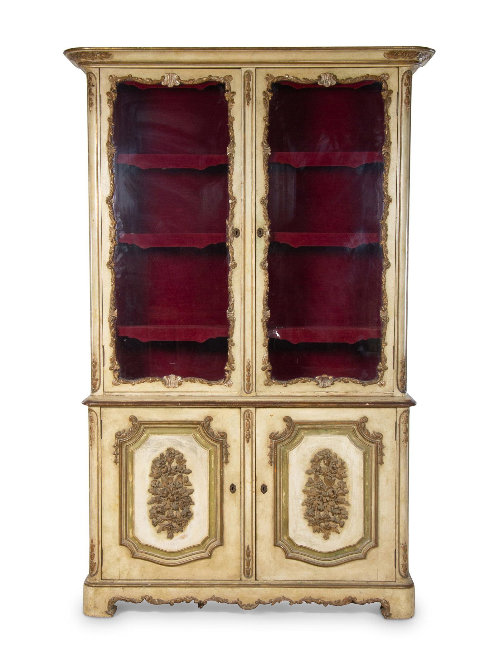A Venetian Style Painted and Parcel Gilt Bookcase: A Venetian Style Painted and Parcel Gilt Bookcase First Half 20th Century Height 84 x width 50 x depth 17 inches. Property from the Collection of Ron Winter, Merwins Antiques, Birmingham, Michi