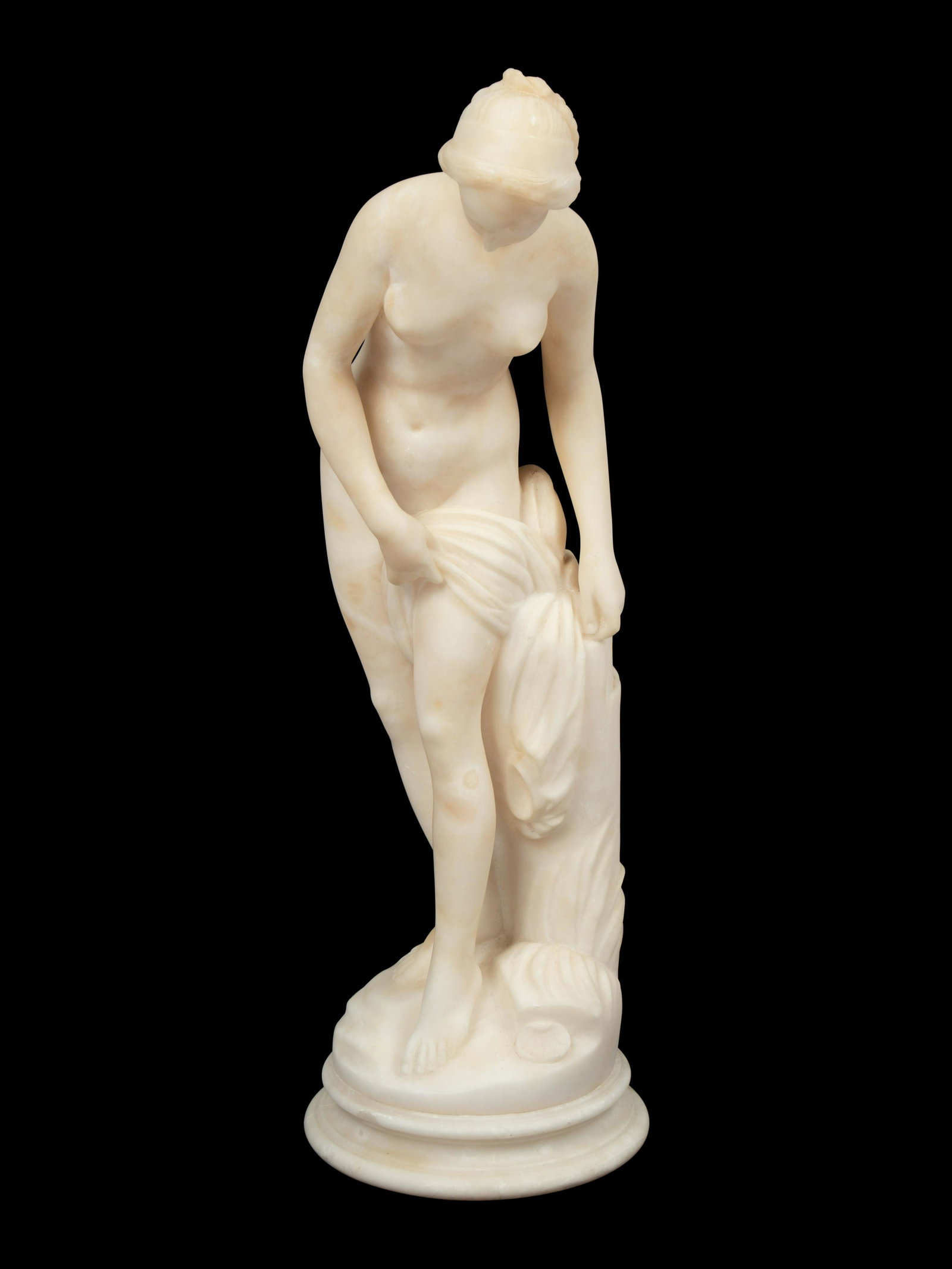 An Italian Alabaster Figure of a Nude: An Italian Alabaster Figure of a Nude Late 19th Century marked Italy to the base. Height 17 1/2 inches.