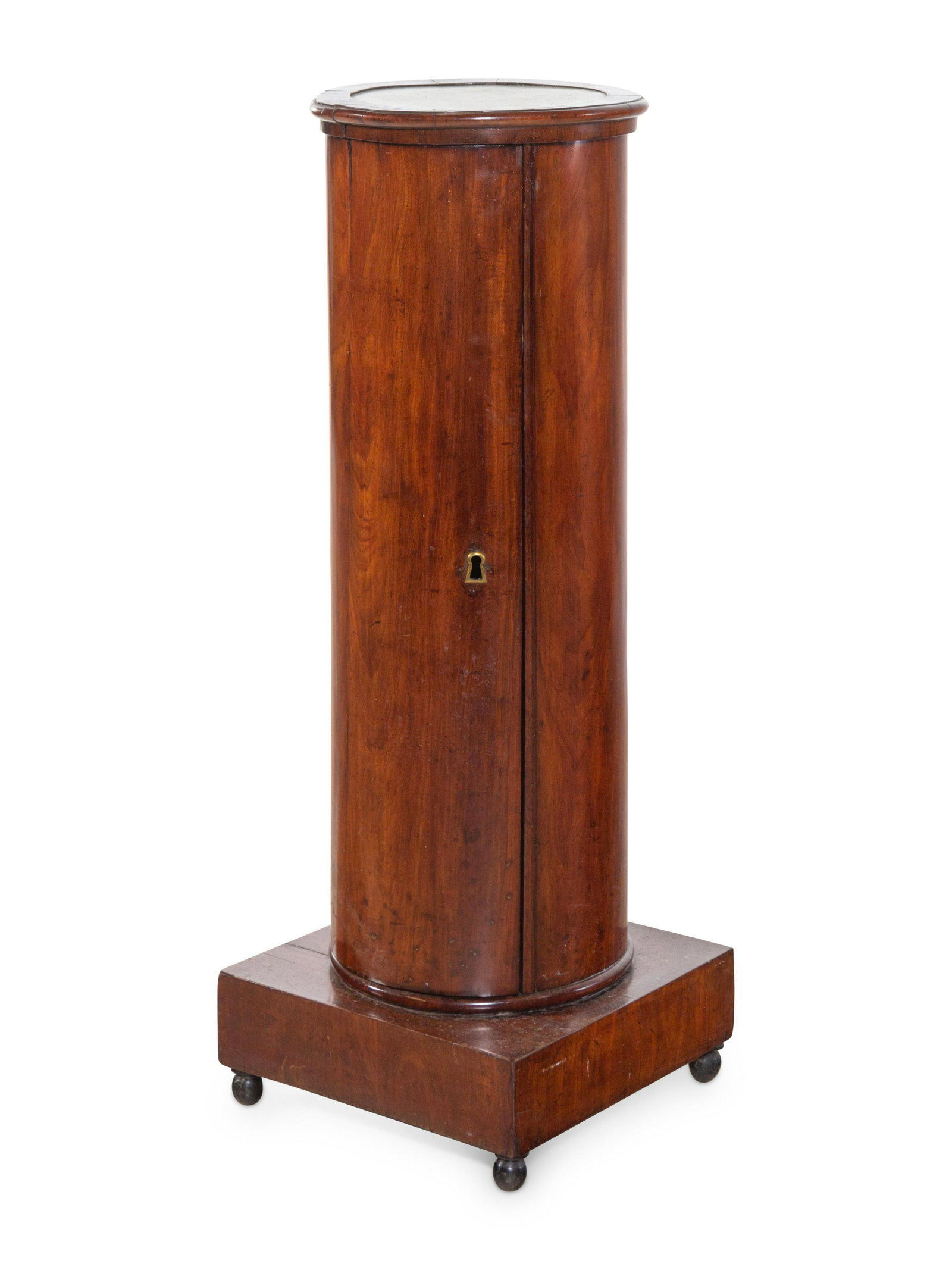 A Continental Mahogany Pedestal Cabinet: A Continental Mahogany Pedestal Cabinet 19th Century Height 41 x width 15 x depth 15 inches. Property from the Collection of Ron Winter, Merwins Antiques, Birmingham, Michigan