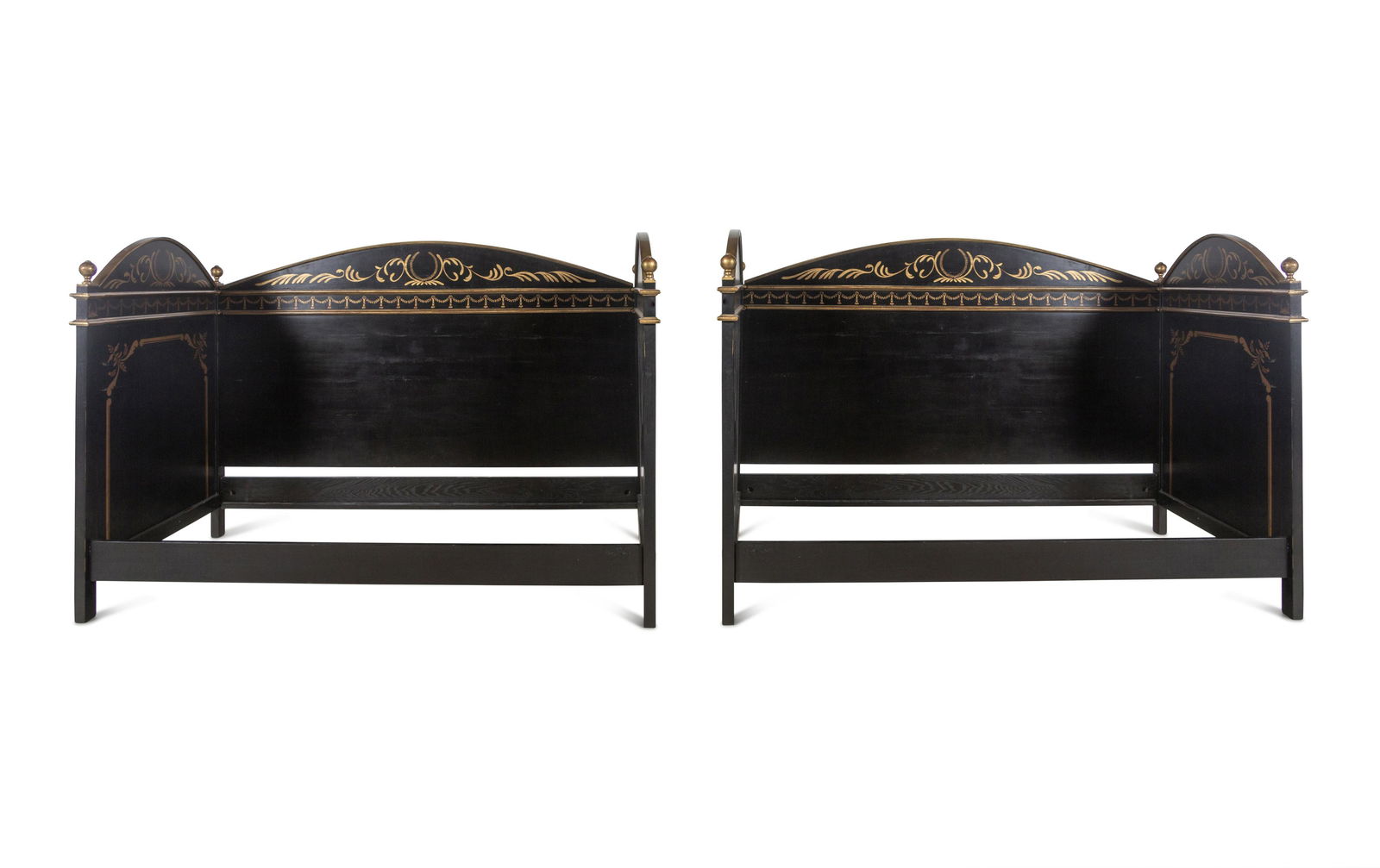A Pair of Painted and Parcel Gilt Daybeds: A Pair of Painted and Parcel Gilt Daybeds 20th Century Height 58 1/4 x length 85 x depth 43 1/2 inches. Property from a Private Collection