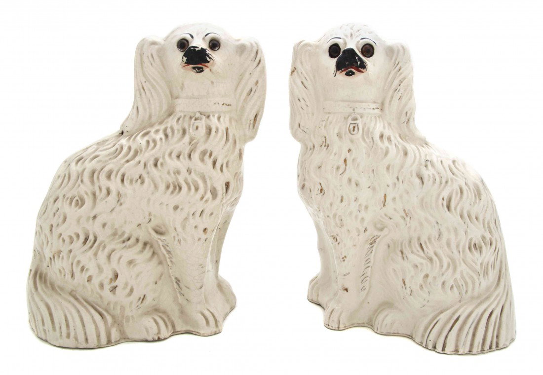 A Pair of Staffordshire Spaniels, Height 12 1/2 in: A Pair of Staffordshire Spaniels, in a seated pose. Height 12 1/2 inches. From the Collection of William Kentor of Highland Park, Illinois