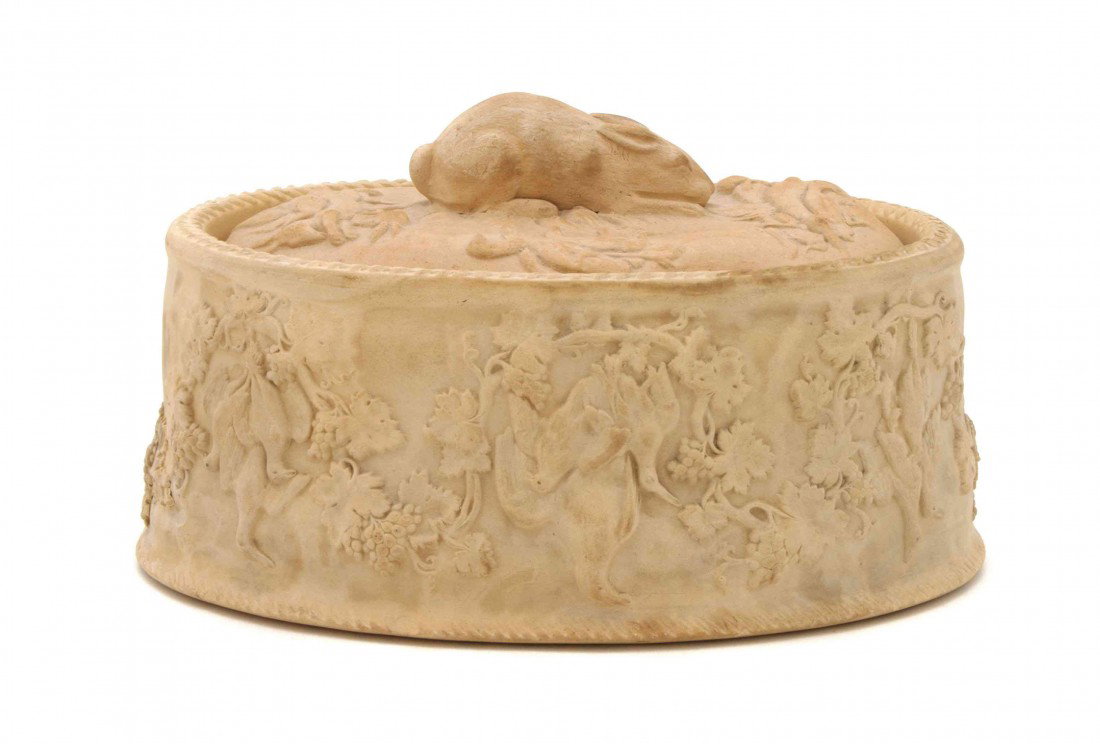 A Wedgwood Creamware Covered Box, Width 7 5/8 inch: A Wedgwood Creamware Covered Box, decorated with game birds in relief and a hare form finial. Width 7 5/8 inches. Property from the William H. Moore Trust, Dorset, Vermont
