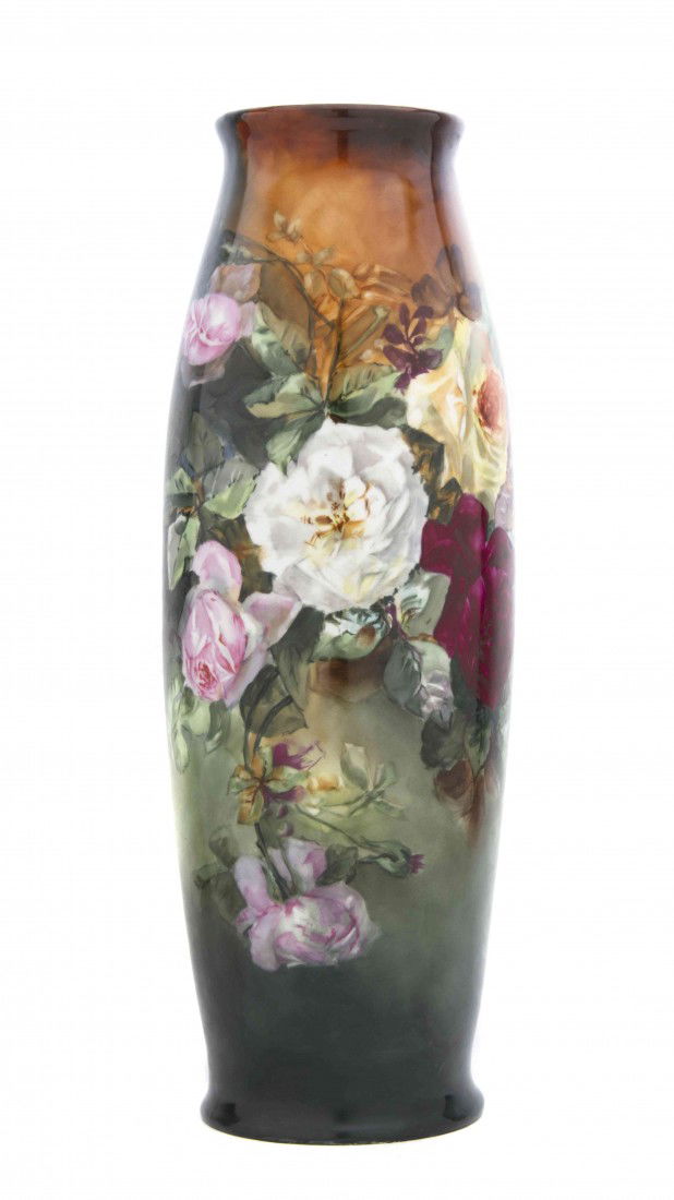 A Limoges Porcelain Vase, Tressemanes & Vogt, Heig: A Limoges Porcelain Vase, Tressemanes & Vogt, of bowed cylindrical form, with flared mouth and foot, polychrome decorated with roses, signed Anna Bosworth. Height 21 7/8 inches.