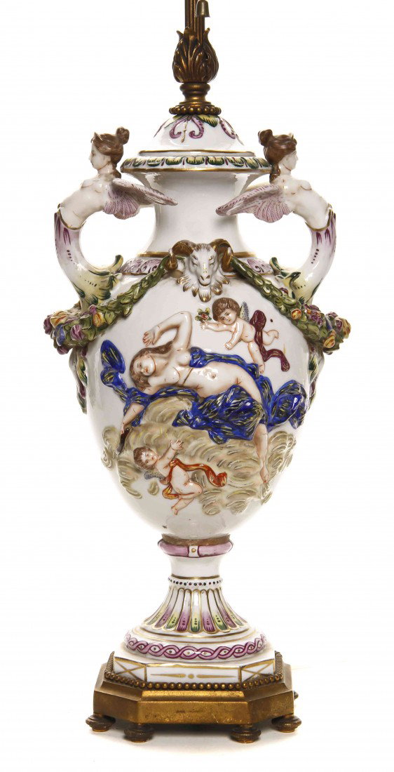 A Capodimonte Covered Urn, Height 14 inches.: A Capodimonte Covered Urn, of handled baluster form, decorated with mythological figures, mounted as a lamp. Height 14 inches.