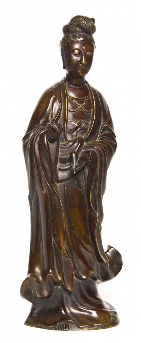 A Bronze Figure of Guanyin, Height 22 inches.: A Bronze Figure of Guanyin, depicted in a standing pose with one hand raised and the other pouring a double gourd vase. Height 22 inches.