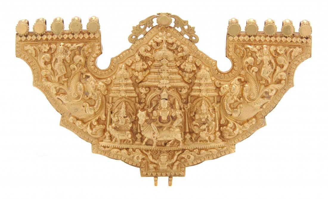 A Southeast Asian Gold Pendant, Height 3 3/4 x wid: A Southeast Asian Gold Pendant, having a central stupa rising above a figure seated atop a bull, flanked by an elephant-headed deity and multi-armed figure within scrolling foliage, the top and bottom