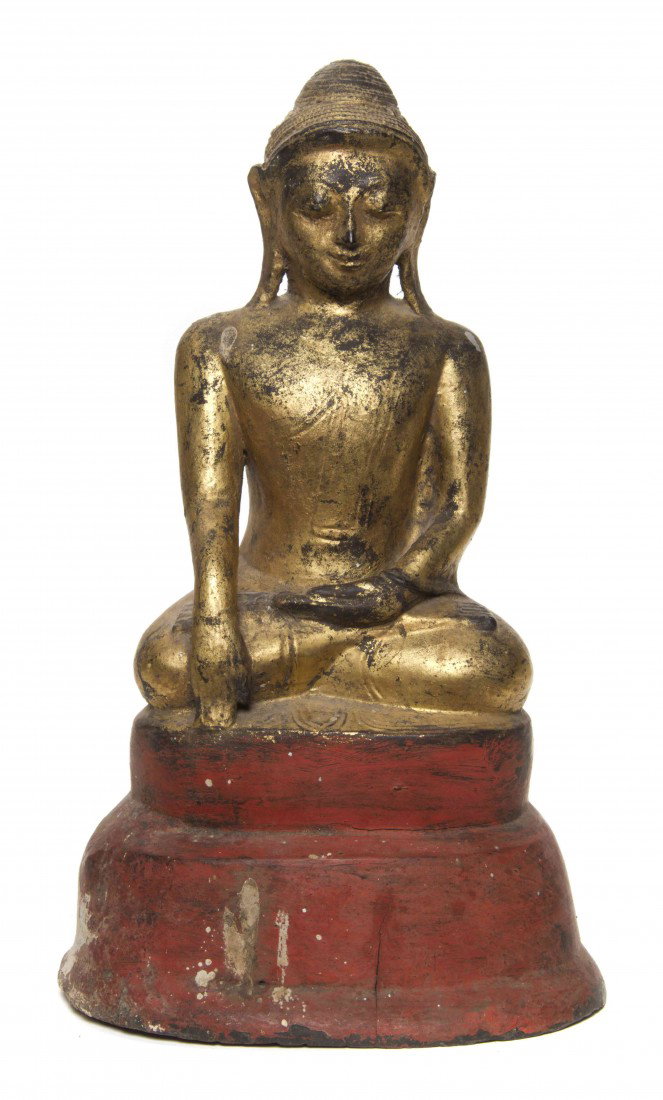A Southeast Asian Model of Buddha, Height 16 5/8 i: A Southeast Asian Model of Buddha, formed of grasses and mud, the seated figure having gilt throughout with a red paint over the conforming base. Height 16 5/8 inches. Property from the Collection of 