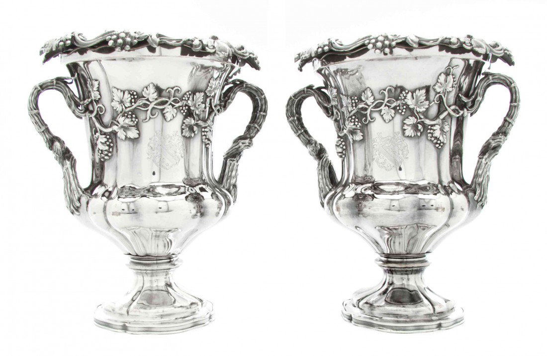 A Pair of English Silverplate Wine Coolers, Height: A Pair of English Silverplate Wine Coolers, each of handled urn form, with grape and vine decoration. Height 11 1/2 inches.