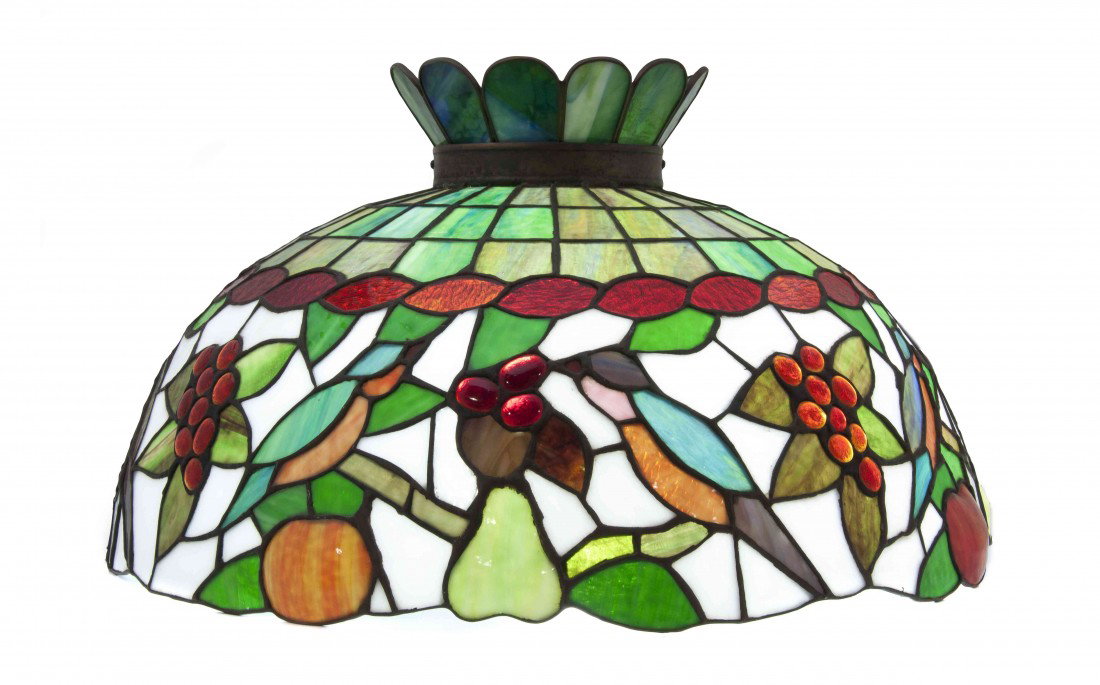 An American Leaded Glass Shade, Diameter of shade: An American Leaded Glass Shade, the domed shade having a scalloped crown over a fruit and bird border. Diameter of shade 24 inches. Property from the Estate of John Haight, Arlington Heights, Illinois