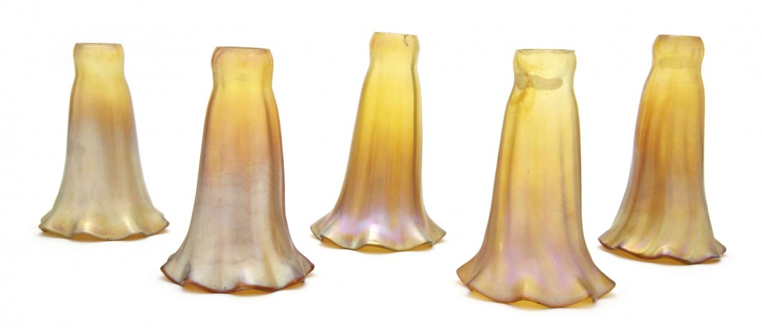 An Assembled Set of Five Charles Lotton Lily Shad: An Assembled Set of Five Charles Lotton Lily Shades, of varying sizes with gold iridescence. Height of tallest 4 7/8 inches. Property from the Estate of John Haight, Arlington Heights, Illinois