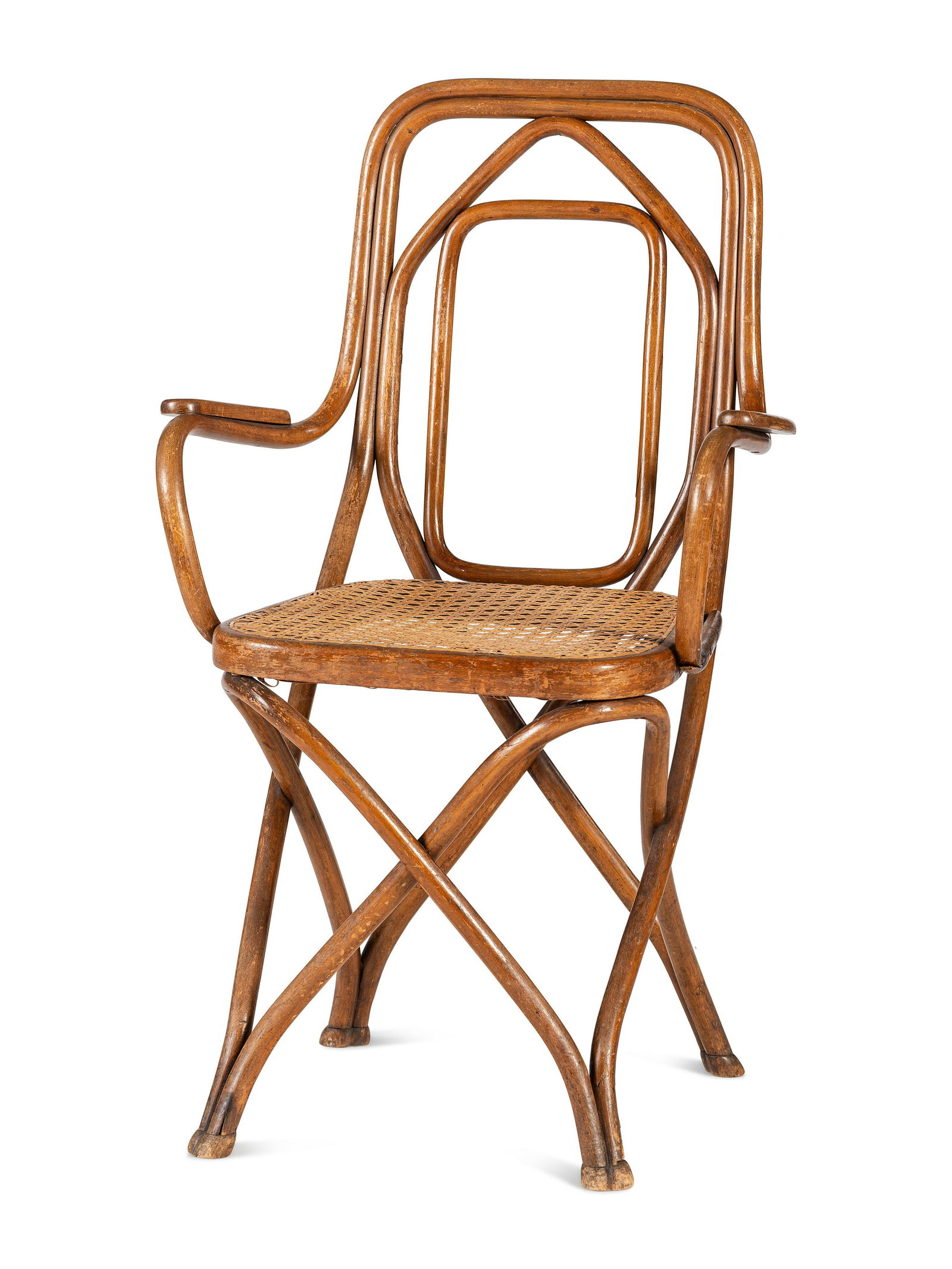 A Beech Bentwood Armchair, Likely Designed by August Thonet: A Beech Bentwood Armchair, Likely Designed by August Thonet Austrian, Early 20th Century model no. 51, with a Thonet Wien paper label. Height 36 x width 22 3/4 x depth 21 1/2 inches. Note: This l