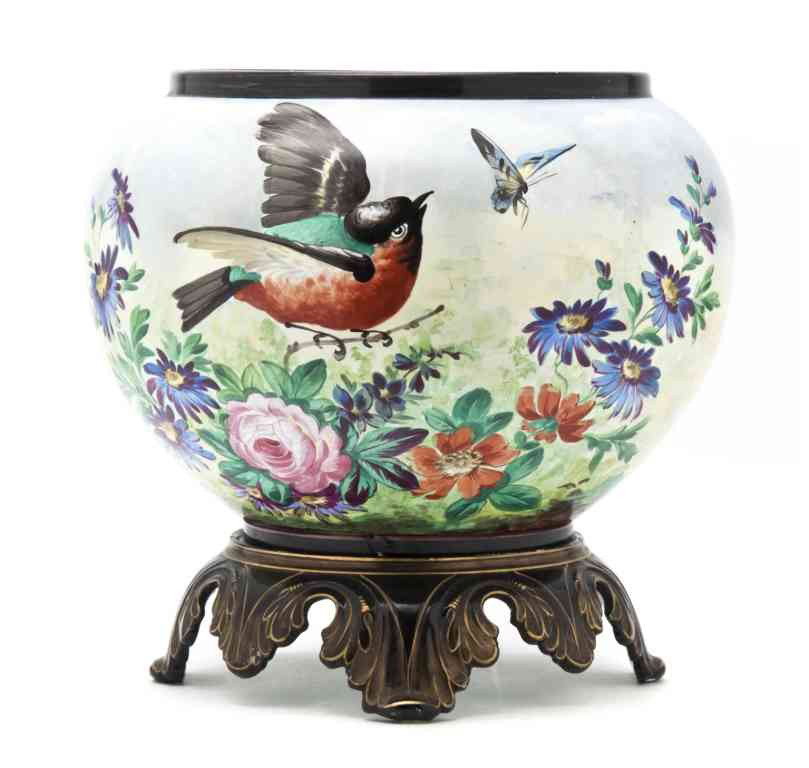 A Painted Ceramic Jardiniere, Height overall 12 1: A Painted Ceramic Jardiniere, the ovoid body decorated with birds, flowers and butterflies, set on a mirrored ceramic base with gilt highlights. Height overall 12 1/2 inches.