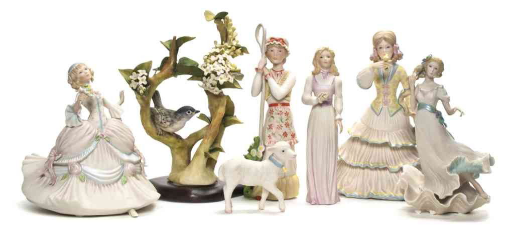 A Collection of Six Cybis Porcelain Articles, Hei: A Collection of Six Cybis Porcelain Articles, comprising five female figurines, one with a separate sheep and a bird on a flowering branch. Height of tallest 10 inches.