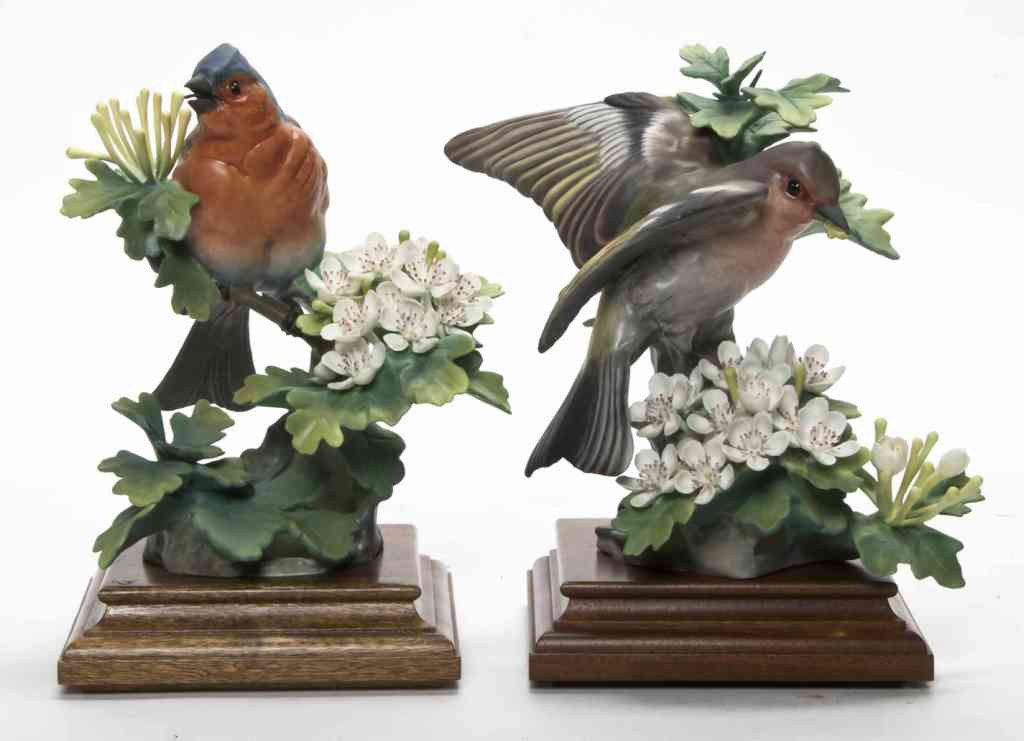 A Pair of Royal Worcester Dorothy Doughty Birds, : A Pair of Royal Worcester Dorothy Doughty Birds, Chaffinches, seated on flowering May Blossom branches. Height 8 inches.