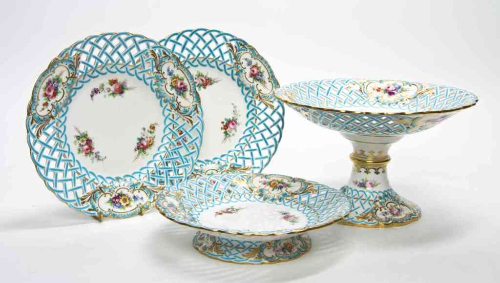 A Partial Minton Dessert Service, Height of first: A Partial Minton Dessert Service, comprising a compote, a tazza and three plates. Height of first 6 inches. Property from an Estate, Kenilworth, Illinois