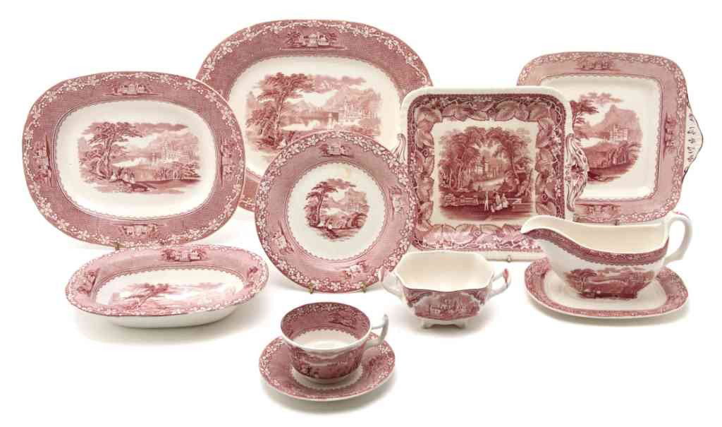 A Collection of English Transfer Decorated Articl: A Collection of English Transfer Decorated Articles, in a Jenny Lind pattern, comprising two oval trays, two handled trays, an oval bowl, a gravy, a sugar, two cups, four saucers and a dish. Width of 