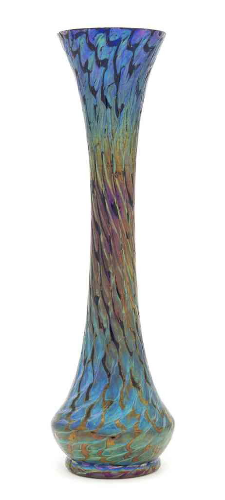 A Loetz Iridescent Glass Vase, Height 11 5/8 inch: A Loetz Iridescent Glass Vase, of baluster form, with a flared lip, apparently unmarked. Height 11 5/8 inches. Property from the Estate of John Haight, Arlington Heights, Illinois