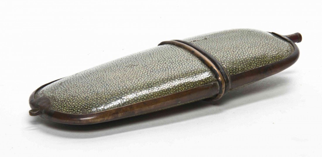 A Shagreen Glasses Case, Length 7 1/2 inches.: A Shagreen Glasses Case, of typical form, having metal mounts. Length 7 1/2 inches.