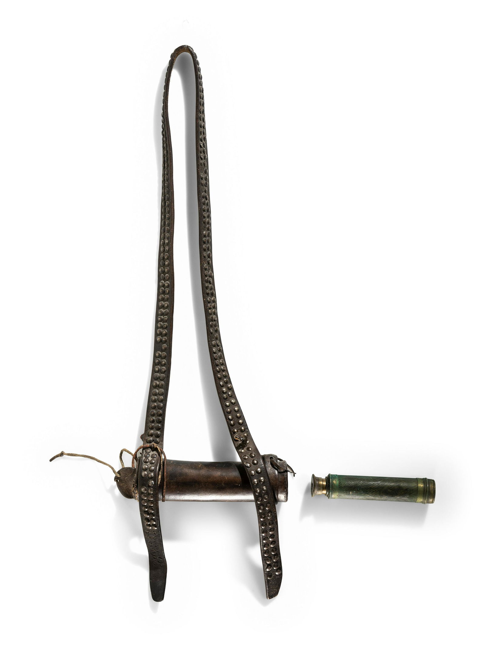Plains Tacked Telescope and Case: Plains Tacked Telescope and Case fourth quarter 19th century crafted from harness leather, with tacked strap overall length 27-3/4 inches Joseph Henry Sharp painted a portrait of Bill Jones, a
