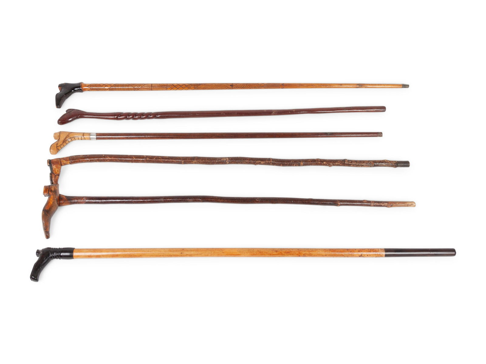 A Group of Folk Art Carved Shoe-Form Canes (1 of 8)