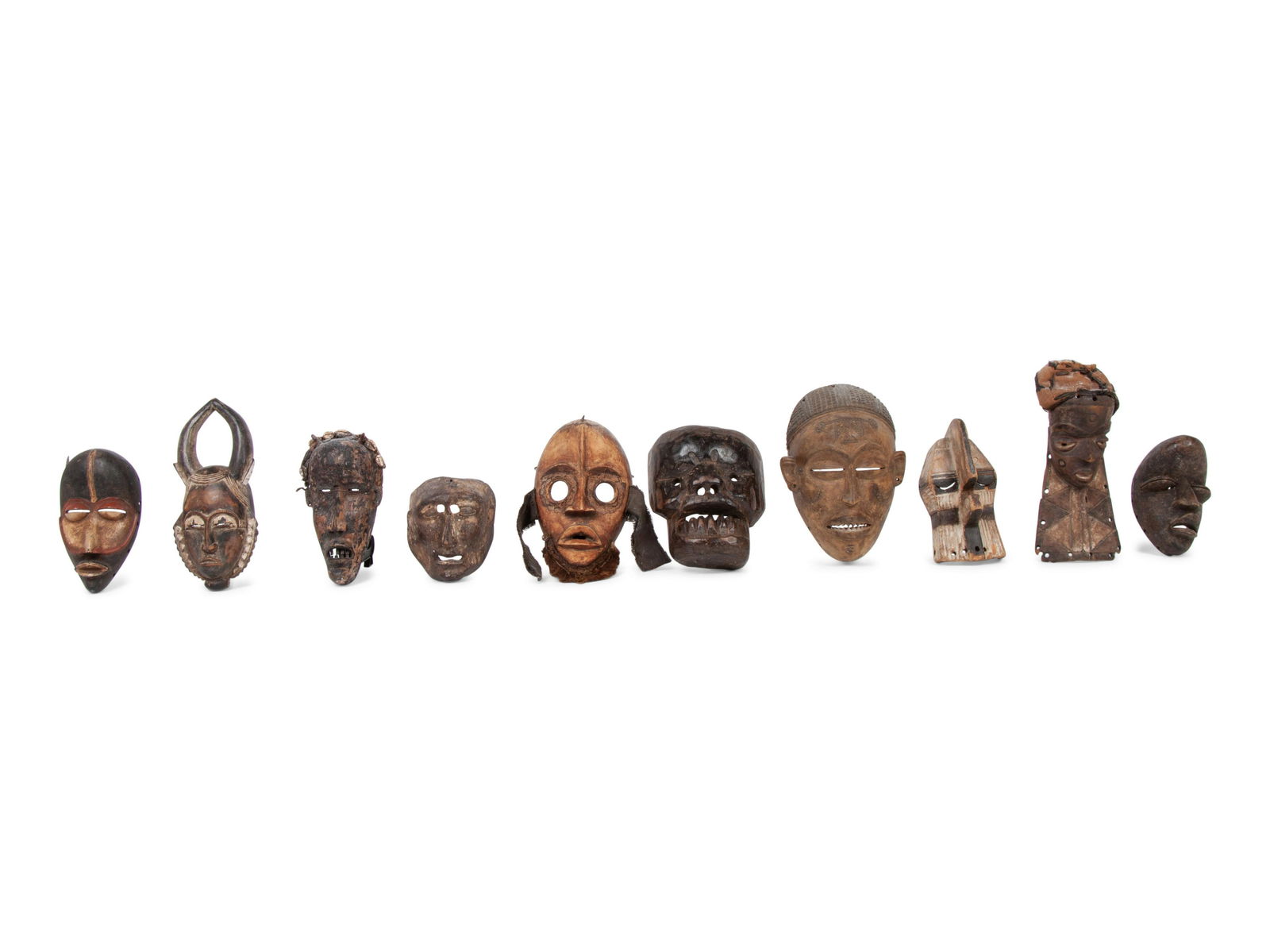 A Group of Ten Carved Ethnographic Masks (1 of 1)