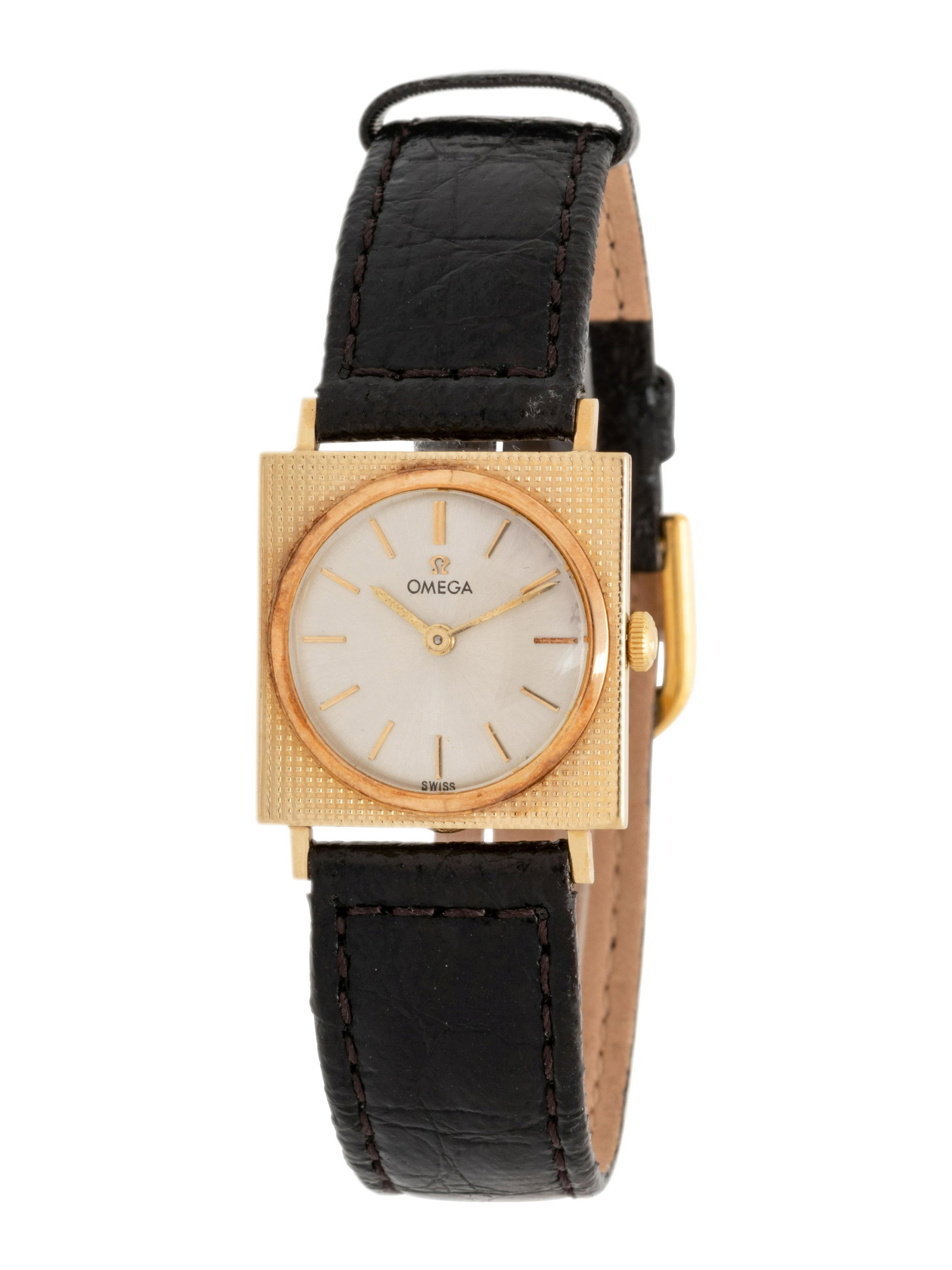 OMEGA, 14K YELLOW GOLD WRISTWATCH: OMEGA, 14K YELLOW GOLD WRISTWATCH 23.00 x 23.00 mm case dimensions, textured gold bezel, matte silvered dial, applied gold baton numerals, 17 jewel manual wind movement signed OMEGA WATCH Co SWISS, bl