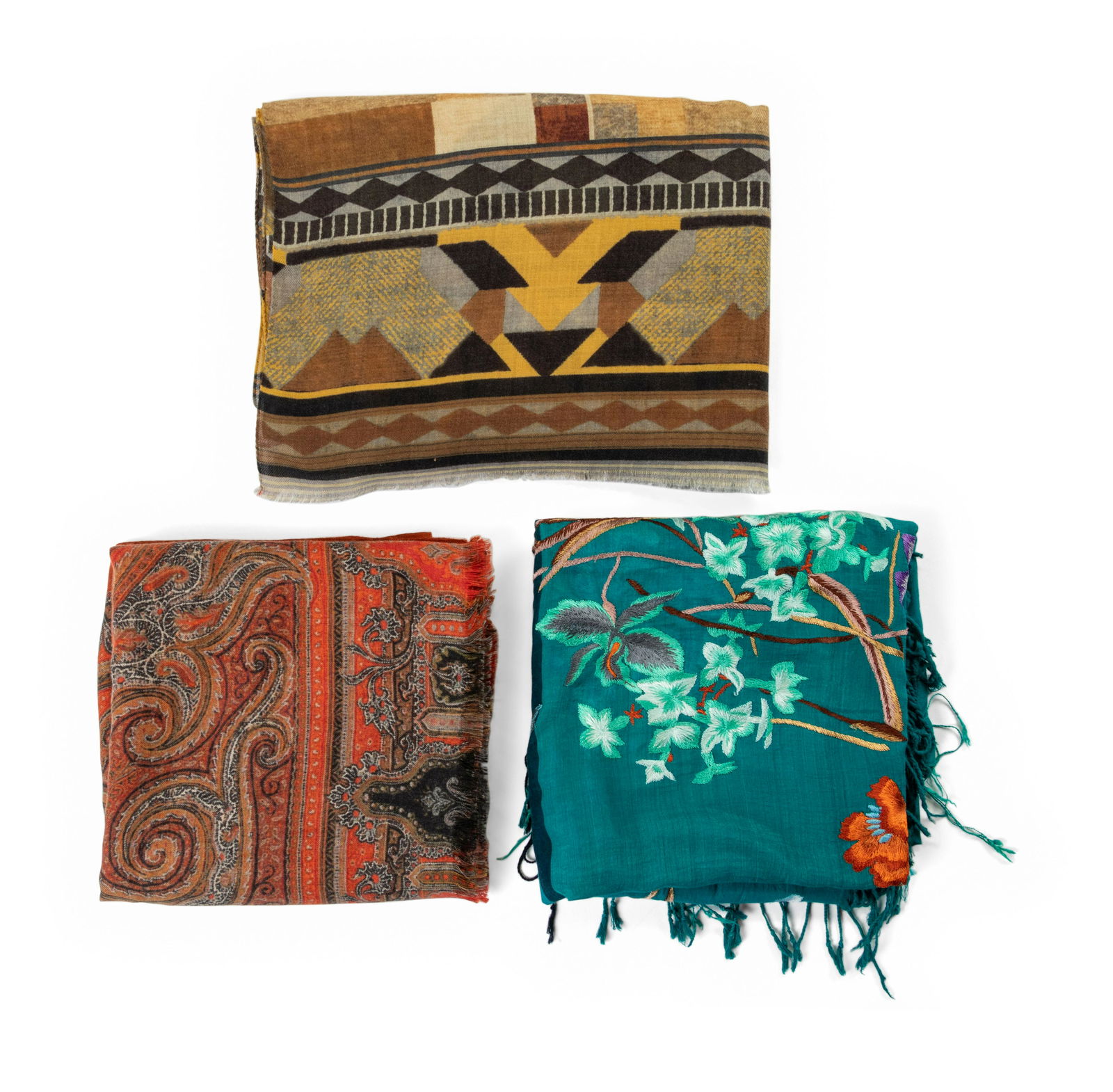 Three Designer Scarves: One Dries Van Noten, Two Etro: Three Designer Scarves: One Dries Van Noten, Two Etro This lot contains three scarves. THE FIRST Yellow, brown, and blue wool/silk blend scarf with paneled geometric prints and frayed edges. Label: Et