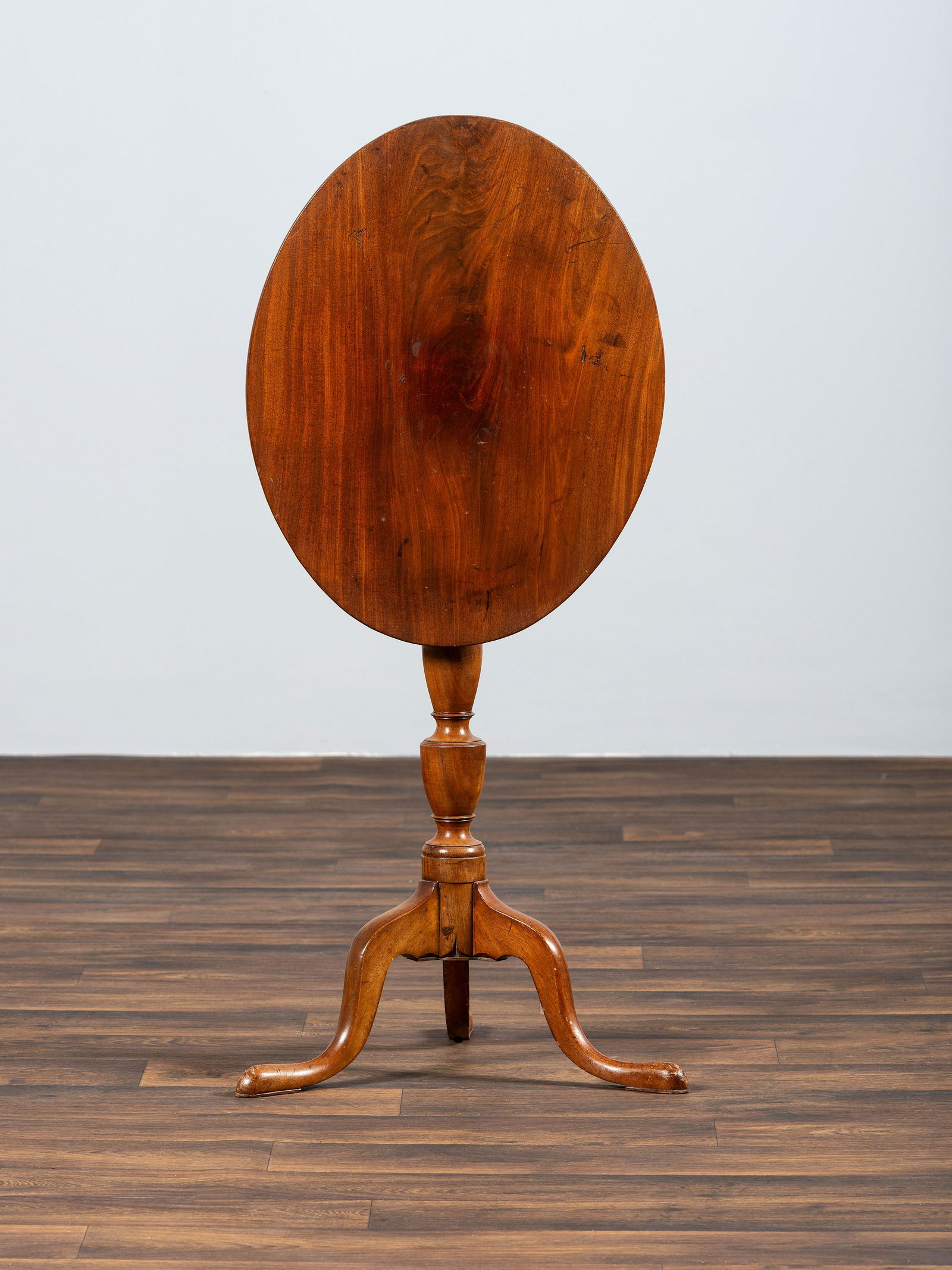A Federal Carved Mahogany Tilt-Top Candlestand (1 of 3)