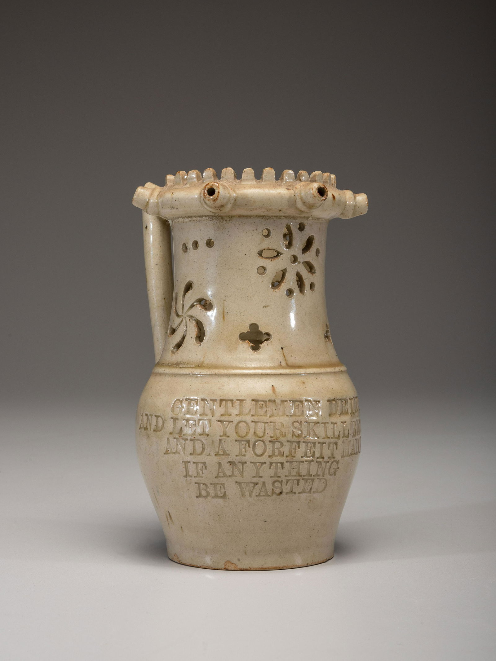 An Incised and Impressed Stoneware Puzzle Jug (1 of 5)