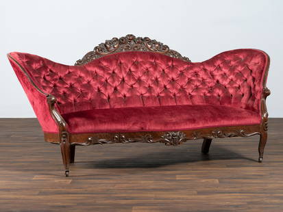 A Victorian Floral Carved Rosewood Parlor Settee: A Victorian Floral Carved Rosewood Parlor Settee In the Manner of Alexander Roux, Circa 1890 Height 46 x width 65 x depth 19 inches.