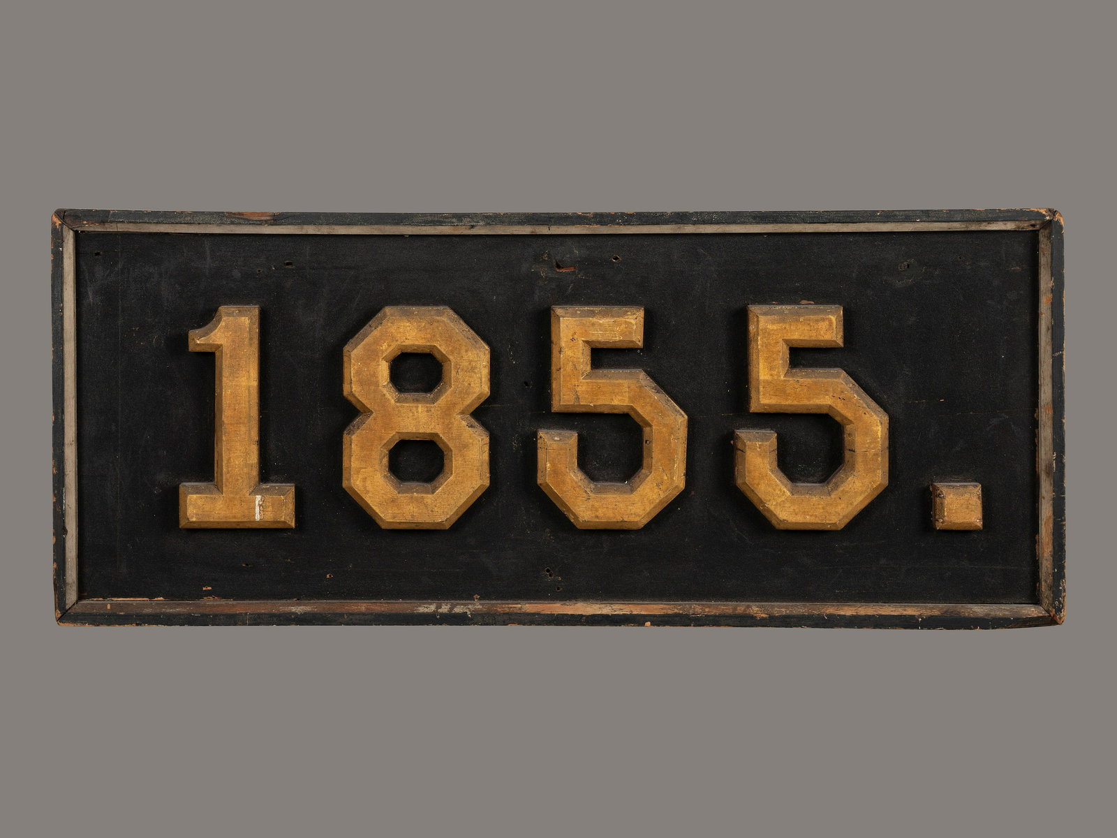 A Carved, Black and Gold Painted Pine Trade Sign (1 of 2)