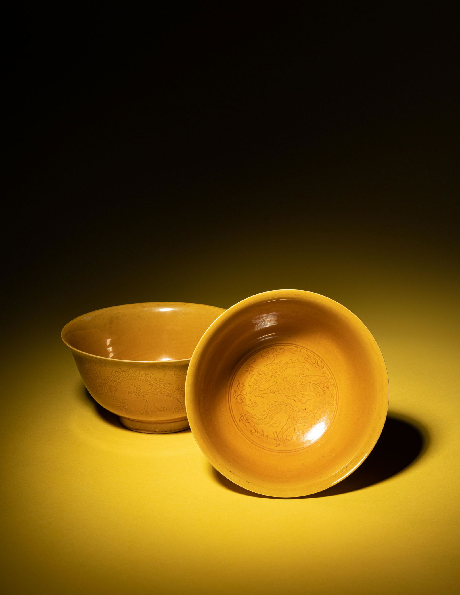 A Pair of Incised Yellow Glazed Porcelain 'Dragon' Bowls (1 of 4)