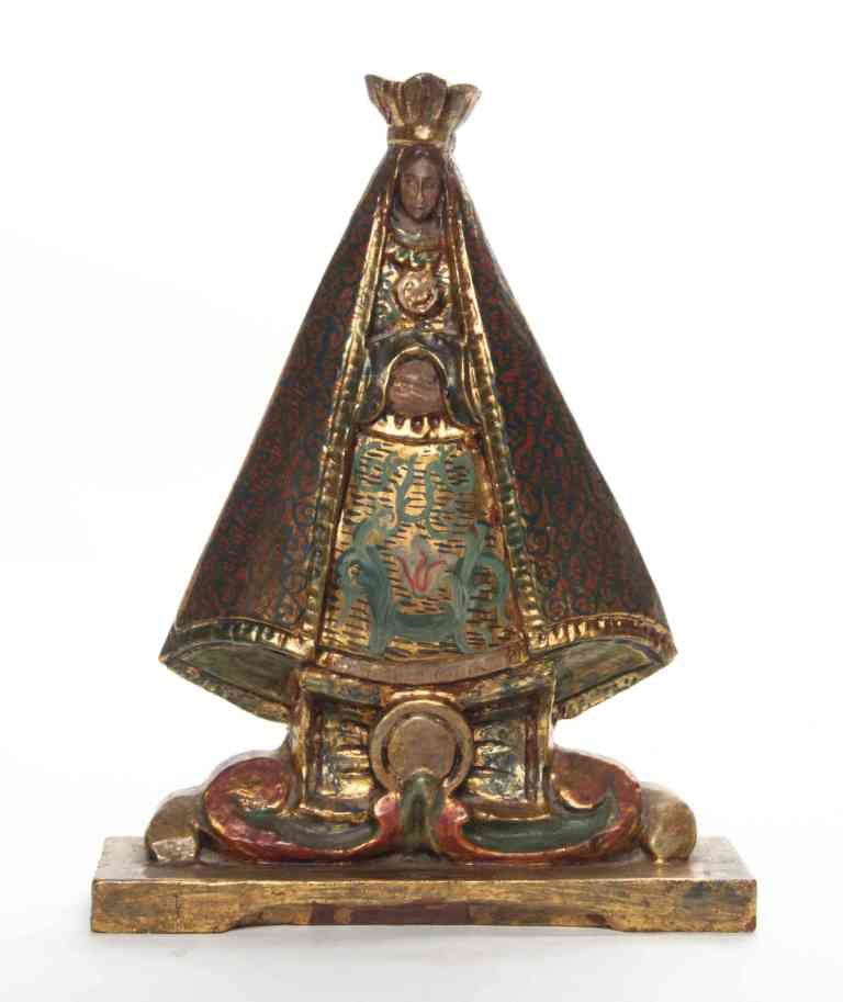 A Mexican Gilt and Polychrome Decorated Santos Figu: A Mexican Gilt and Polychrome Decorated Santos Figure, the figure depicted standing in robes and a crown on a scrolling base. Height 12 1/4 inches.
