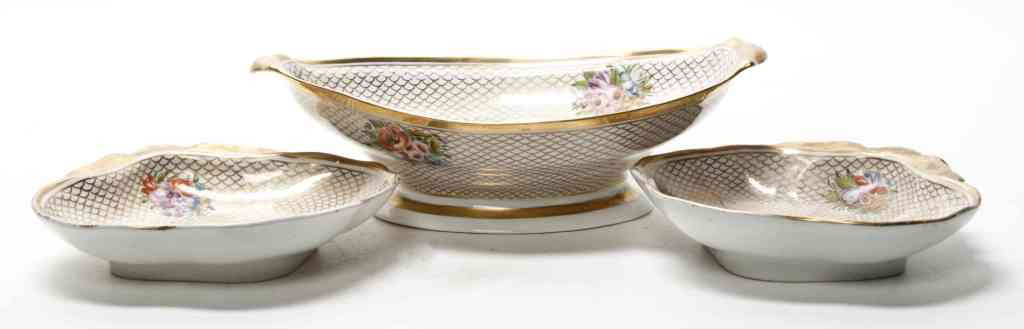 A Group of Three English Porcelain Articles, Width: A Group of Three English Porcelain Articles, comprising a center bowl and two shell form dishes. Width of wider 12 5/8 inches.