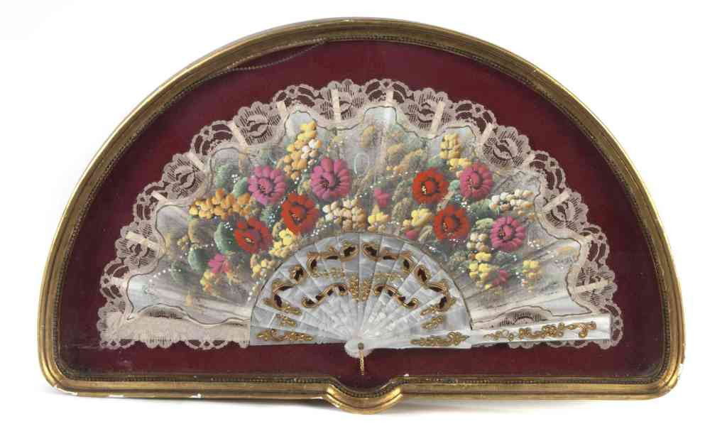 A French Gilt Decorated Mother-of-Pearl and Lace F: A French Gilt Decorated Mother-of-Pearl and Lace Fan, with allover foliate decoration, set in a giltwood shadow box frame. Width overall 21 1/4 inches.