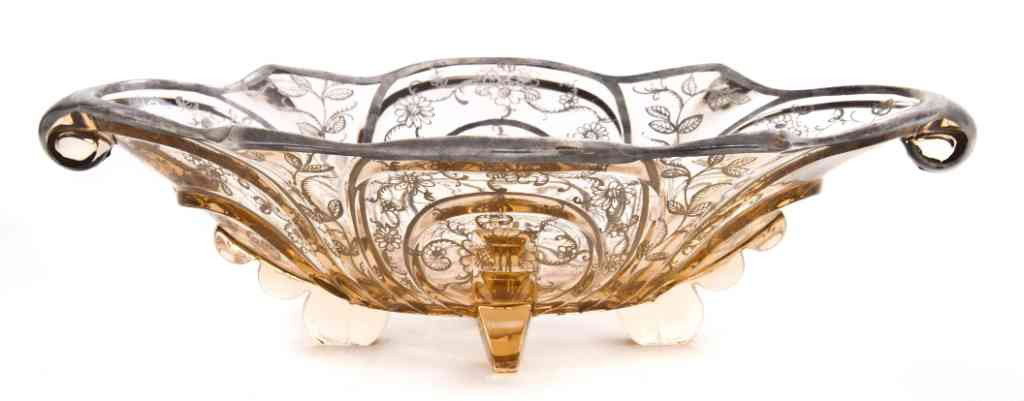 A Silver Overlay Glass Dish, Height 3 3/4 x width: A Silver Overlay Glass Dish, having shaped rim and feet, with flower and vine motif. Height 3 3/4 x width 13 1 /2 x depth 8 3/8 inches.