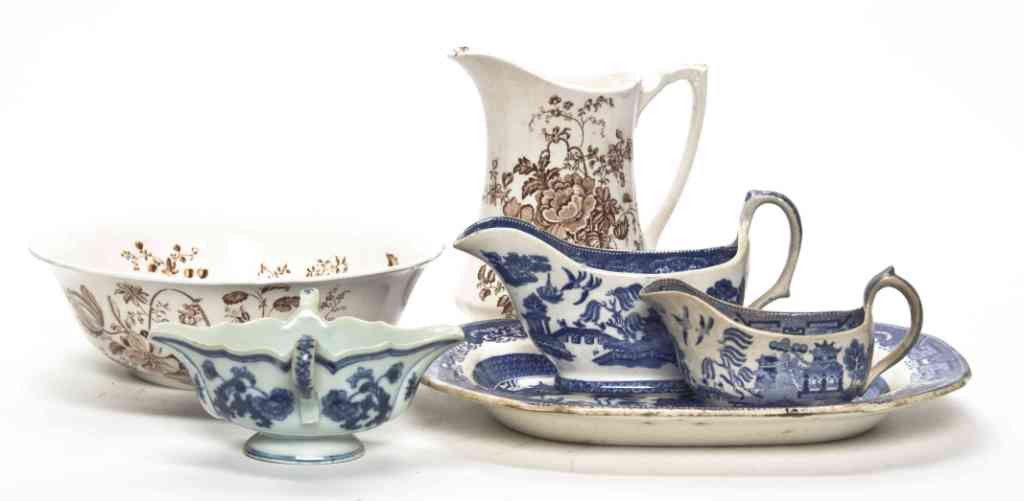 A Collection of Seven English Transfer Decorated A: A Collection of Seven English Transfer Decorated Articles, comprising two sauce boats and a platter in the Blue Willow pattern, a double handled sauce boat and an assembled pitcher and bowl set in the