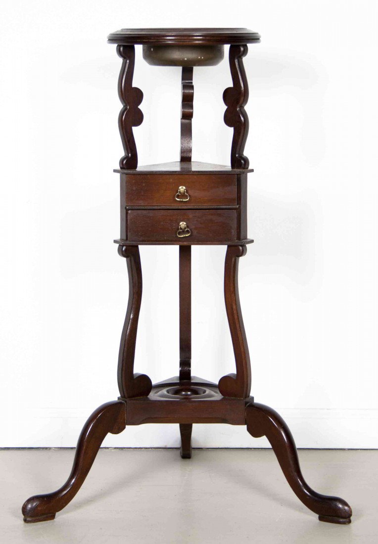 A Victorian Wig Stand, Height 32 inches.: A Victorian Wig Stand, of typical form, with shaped supports on a tripod base. Height 32 inches. Property from the Estate of Mr. Clarence W.W. Smith, Evanston, Illinois