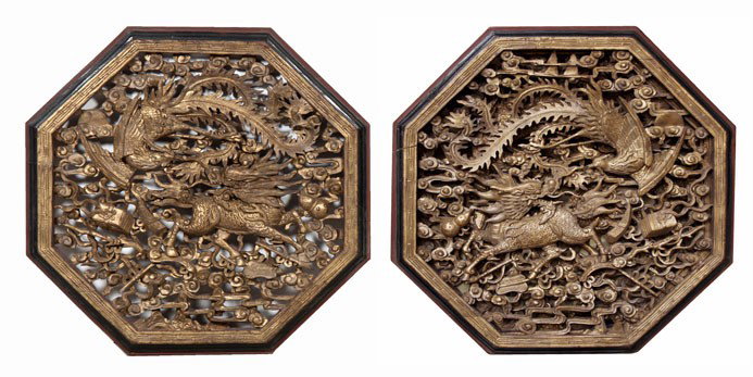 A Pair of Chinese Giltwood Panels, Diameter 31 1/2: A Pair of Chinese Giltwood Panels, of octagonal form, having pierced carving throughout depicting a confronting buddhistic lion and phoenix atop a reserve of scrolling clouds and Buddhist emblems, hav
