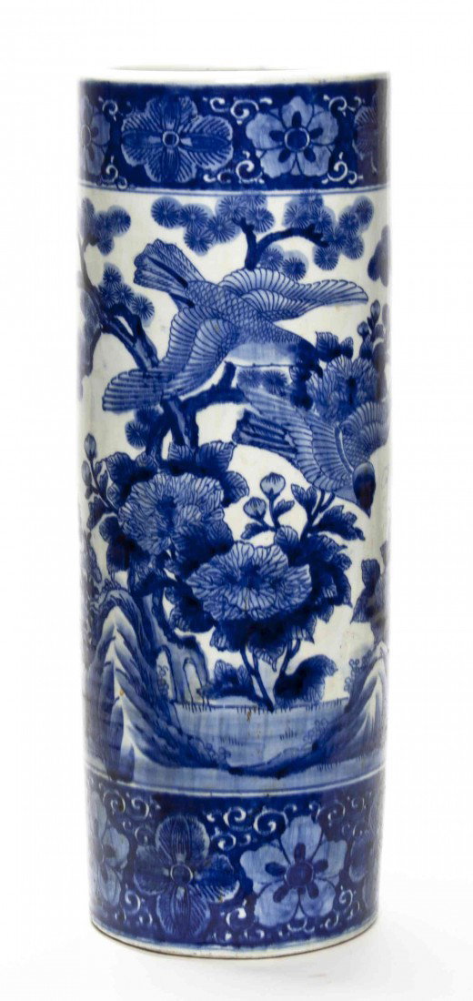 A Chinese Porcelain Umbrella Stand, Height 24 1/4 : A Chinese Porcelain Umbrella Stand, of typical form, having underglazed blue decoration throughout of flowers and birds. Height 24 1/4 inches.
