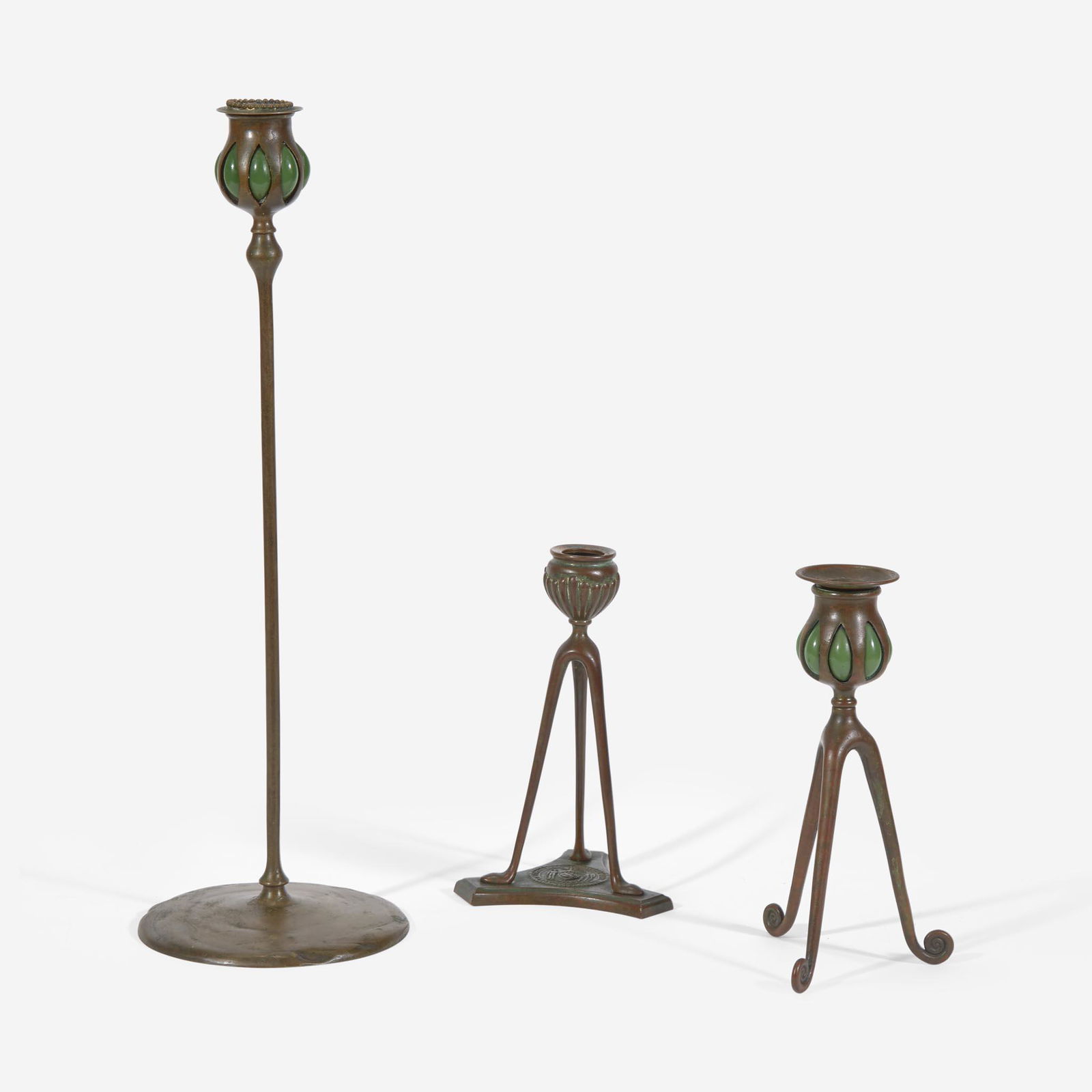 Tiffany Studios (American, active 1878-1932) Group of Three Bronze Candlesticks, New York, circa (1 of 5)