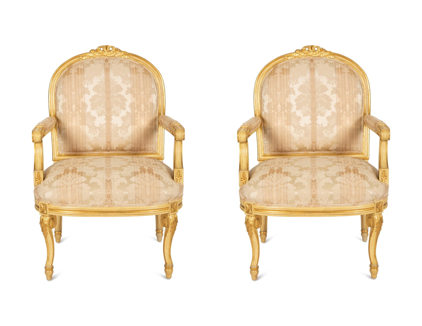 A Pair of Continental Painted and Giltwood Fauteuils: A Pair of Continental Painted and Giltwood Fauteuils 20th Century Height 38 1/2 x width 25 3/4 inches. Property from the Collection of Robert and Mary Montgomery, Palm Beach, Florida