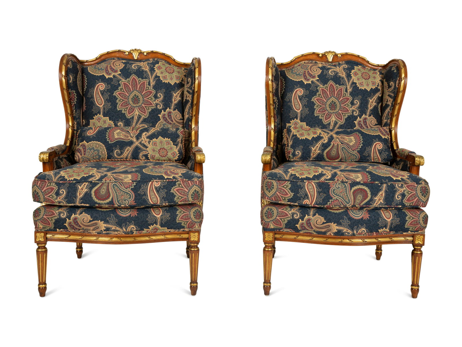 A Pair of Louis XVI Style Parcel Gilt Fruitwood Bergeres: A Pair of Louis XVI Style Parcel Gilt Fruitwood Bergeres 20th Century Height 42 inches. Property from the Collection of Robert and Mary Montgomery, Palm Beach, Florida