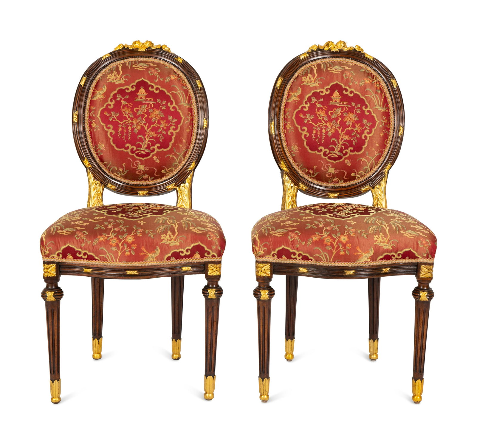 A Pair of Louis XVI Style Stained and Gilt Mahogany Side Chairs. : A Pair of Louis XVI Style Stained and Gilt Mahogany Side Chairs. 20th Century Height 38 inches. Property from the Collection of Robert and Mary Montgomery, Palm Beach, Florida